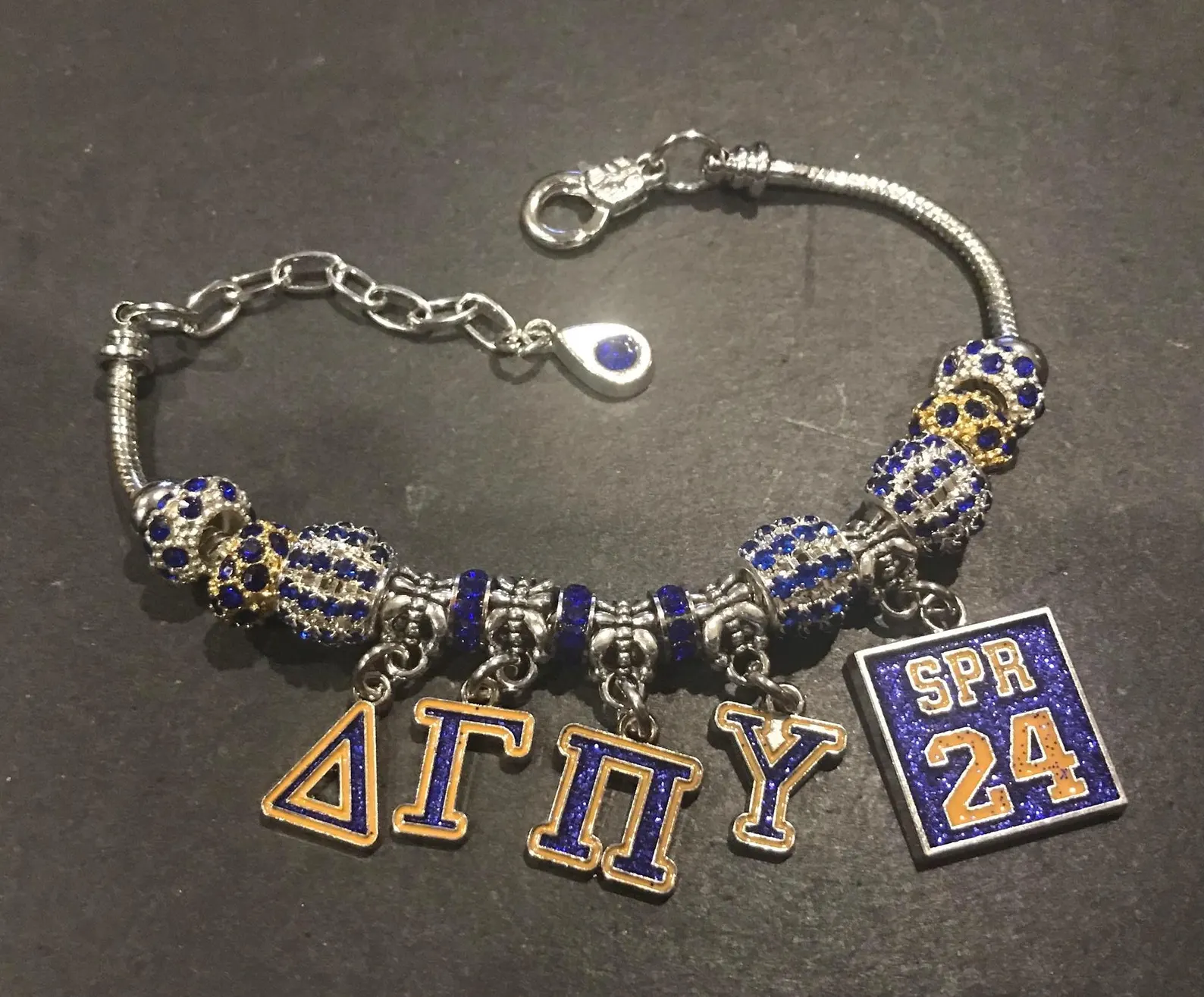 8" Blue & Gold chapter initiate charm bracelet.